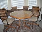 Oak dining room table and chairs