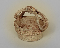 End Cap - I saw a blue plastic end cap on a piece of pipe.  Mary turned it into this lovely little basket.