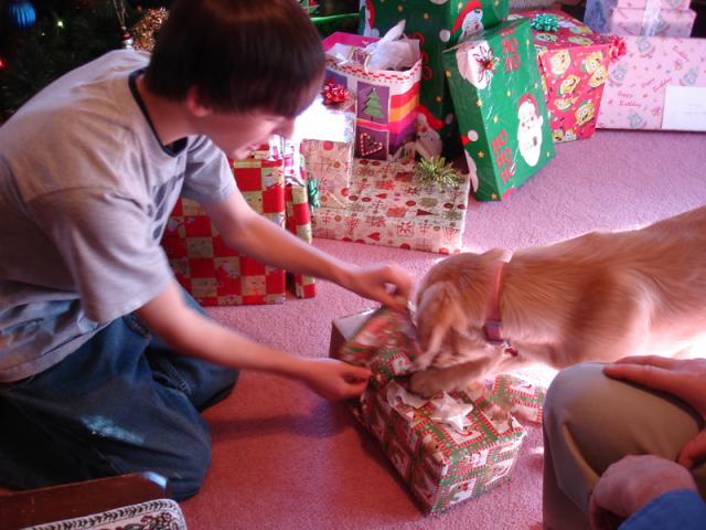 JB helps Chloe open presents Christmas 2008
