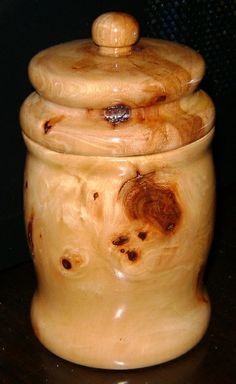 Stash Jars and Pipes designed on a wood lathe by Keith and Diane Gracely of Summerfield, Florida.
