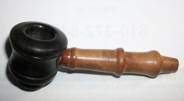Stash Jars and Pipes designed on a wood lathe by Keith and Diane Gracely of Summerfield, Florida.