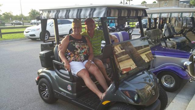 Bonnie and Dave in Golf Cart 001