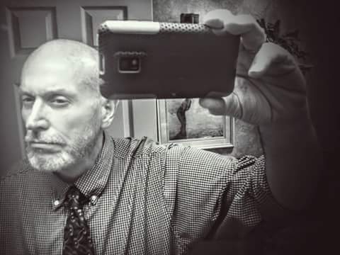 I'm told that I resemble Vladimir Lenin in this photo. :)  The lack of a smile is me concentrating on getting a decent shot. I tend to be a rather happy bloke.