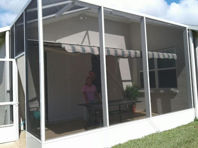Another Village Community Customer enjoying their awning. We can install inside birdcages!