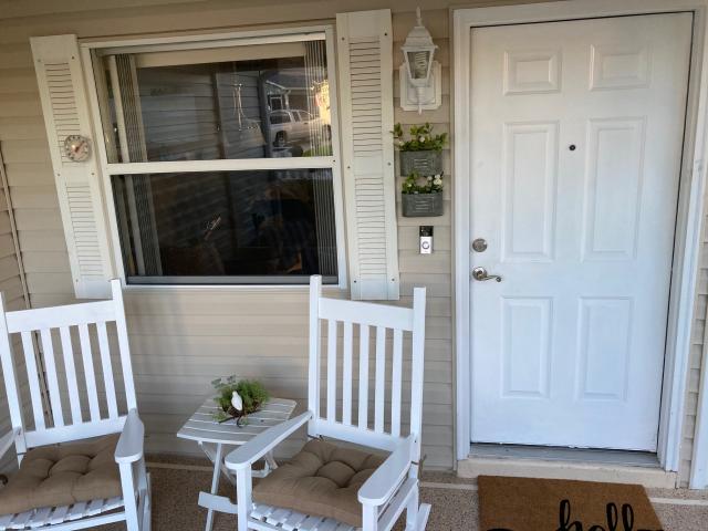 Welcoming front lanai for morning newspaper reading