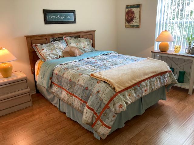 Cheery guest bedroom with bamboo pillows.