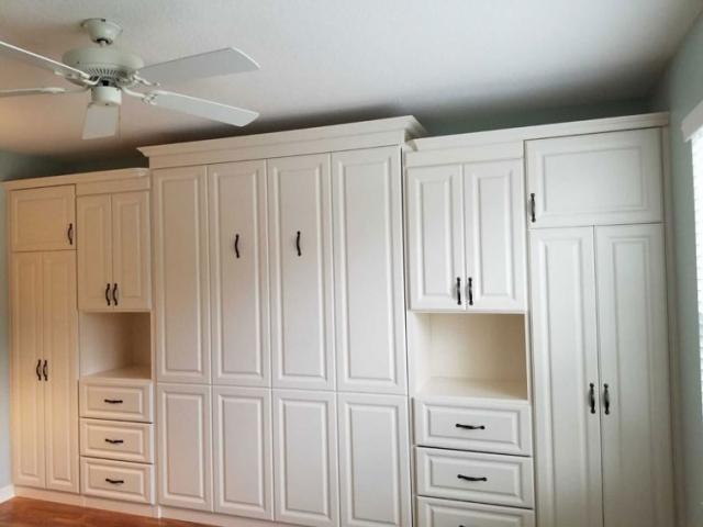 Queen Wall Bed with 2 Tall side cabinets to use as night stands and 2 custom Tall cabinets for extra storage.