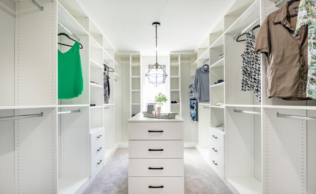Custom Closet High End with center Island with Drawers/Double Hang/Drawer units with Adjustable Shelving above and all around.