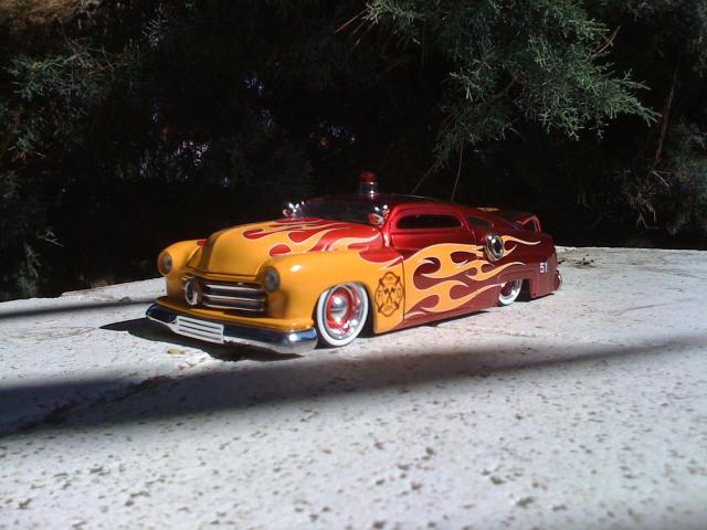 Handmade guitar effects pedal.  It began life as  die cast metal model of a Mercury.  I turned it into an overdrive pedal.  That's what happens when you take a gal to a car show on the first date.