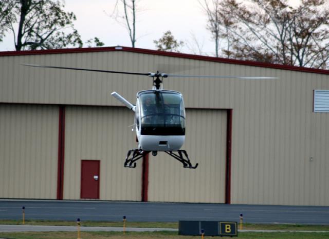 John in his Heli..