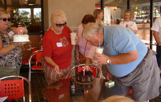 DickY blowing out the candles