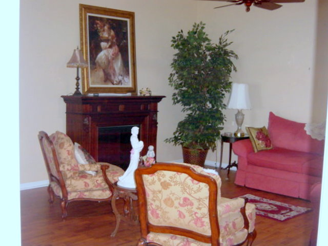 PORTION OF LIVINGROOM SHOWING LAMINATE FLOORS