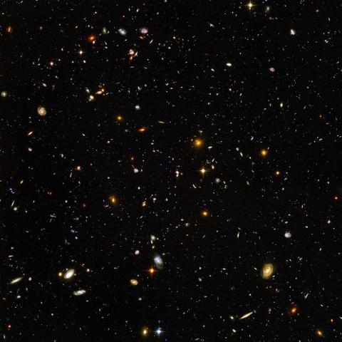 Hubble ultra deep field... thousands of galaxies in one small tiny space of space: the size of a grain of salt held at arm's length yielded this picture.