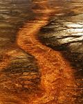 An impression of the Painted Pot hot spring in Yellowstone National Park.