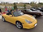 My baby a 2003 “SpeedYellow” Porsche Boxster (did not even come close to winning in the last car show :( but ok winner with me)